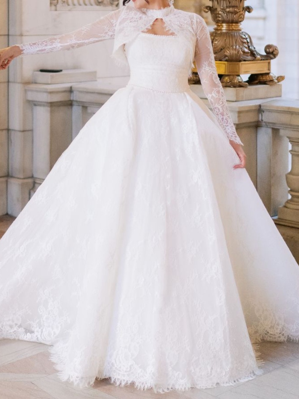 Ivory bridal ball gown with corset back and jacket